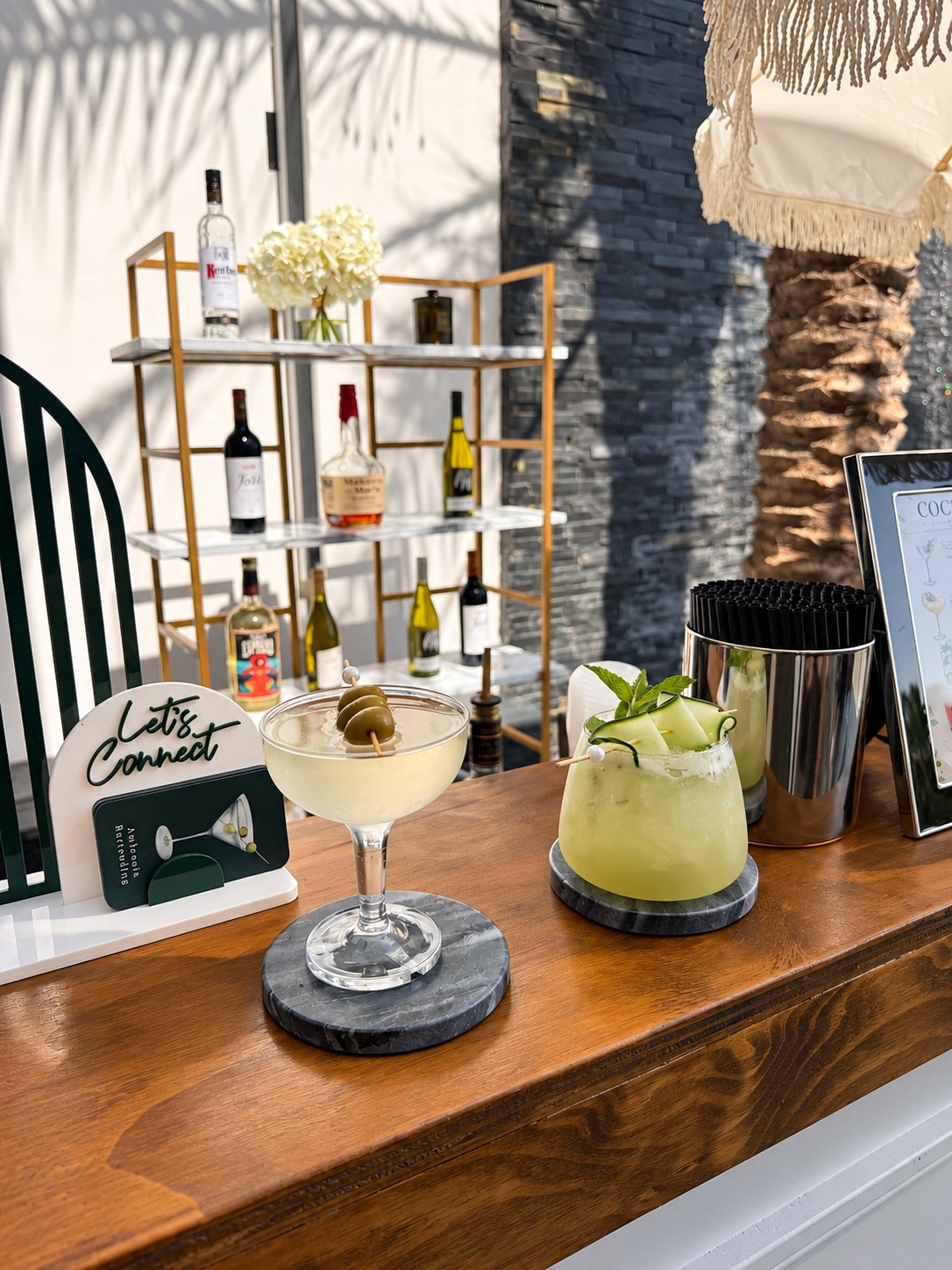 Two signature cocktails at an Ambrosia Bartending setup
